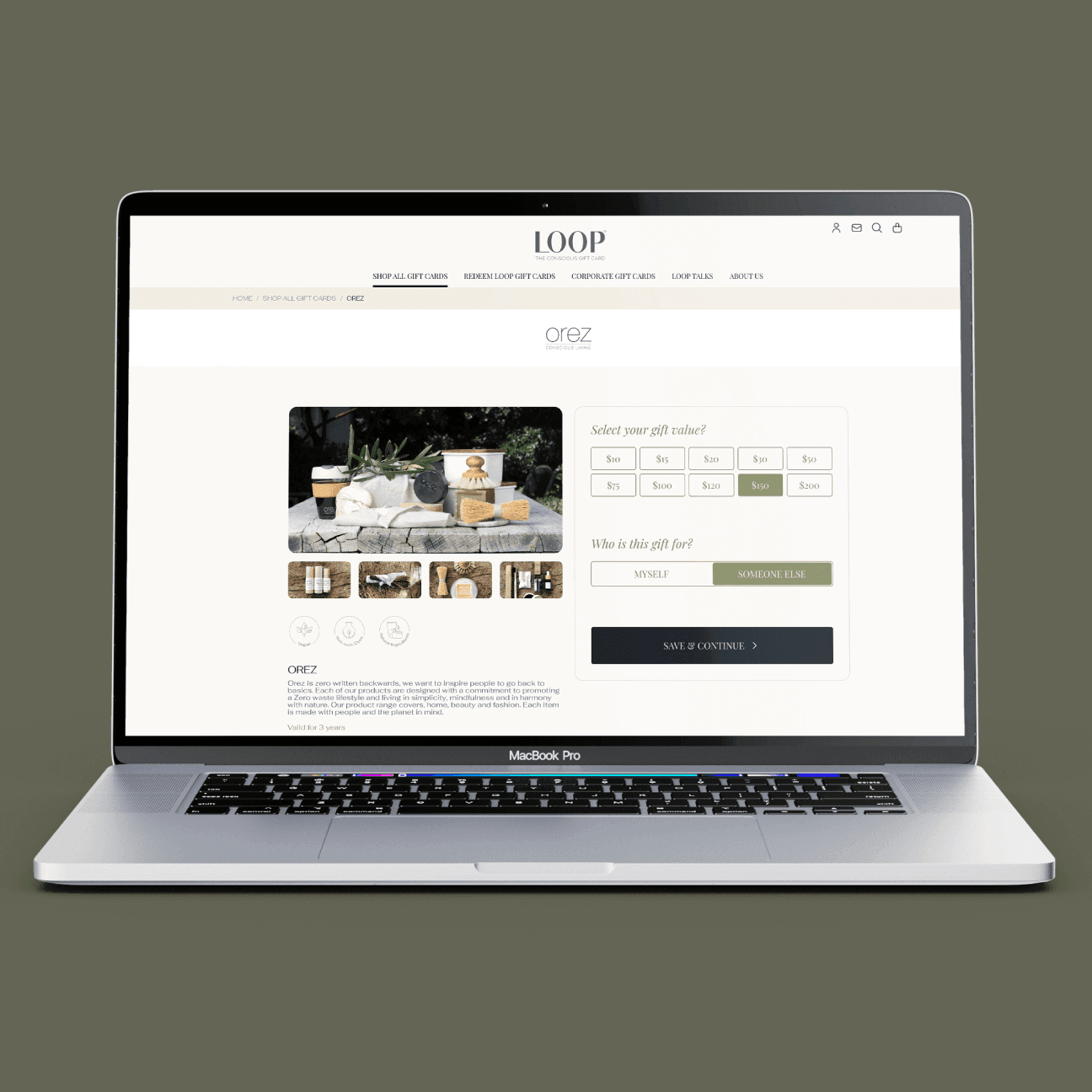 Laptop with open screen showing loop website